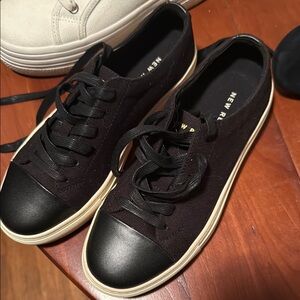Black Canvas Woman’s “ new republic” 
 Sneakers